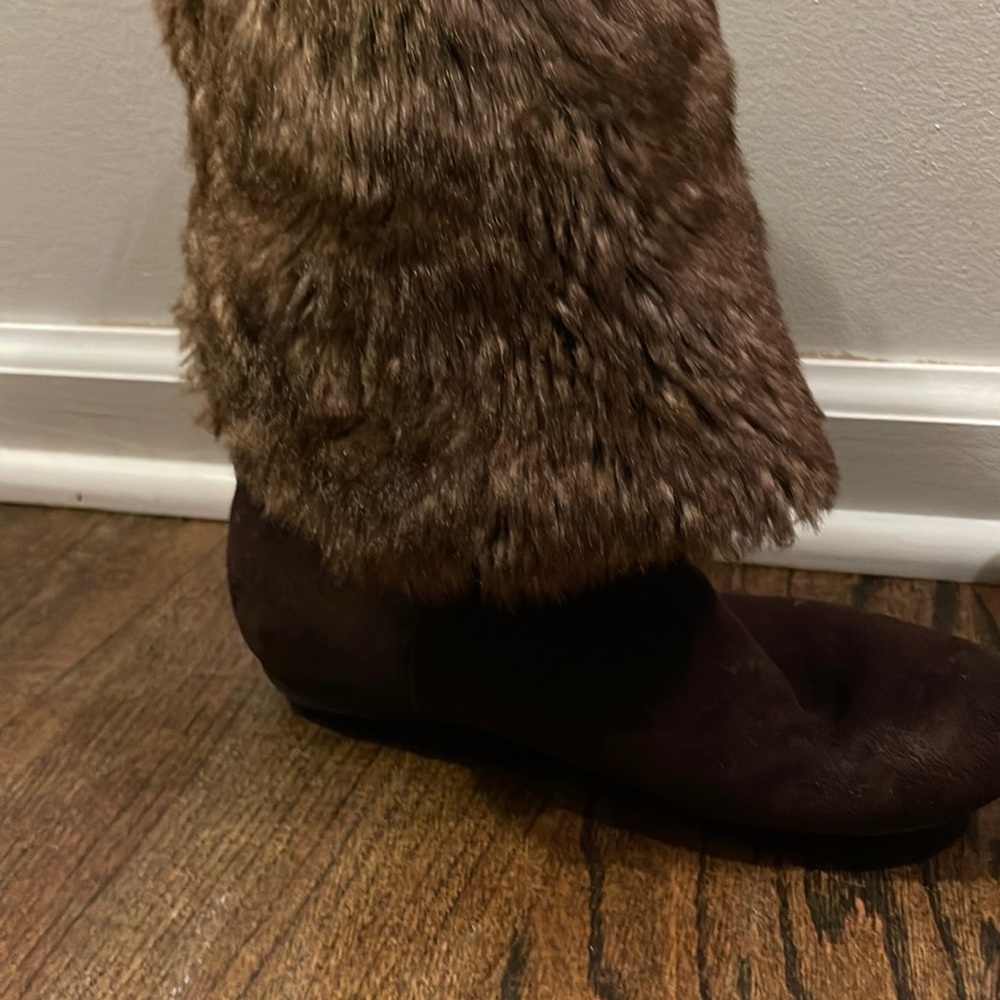 Report gently loved high/low fur boots!